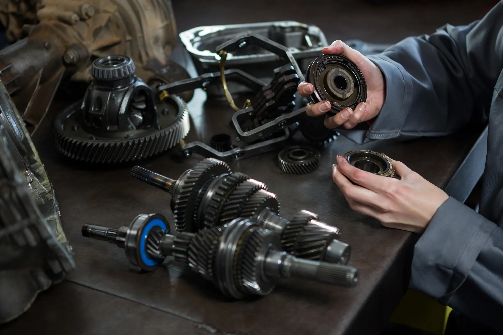 Dual-clutch gearbox components stripped down on the bench for a DSG repair